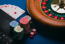 Roulette table poker chips and playing cards representing how to choose a safe online casino